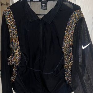 Nike Women's Black Jacket with Multicolor Accents